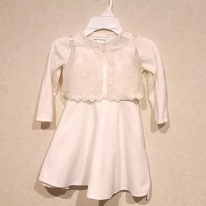 White size 4t dress. Jacket included. See pics for jacket details.Sheer middle.